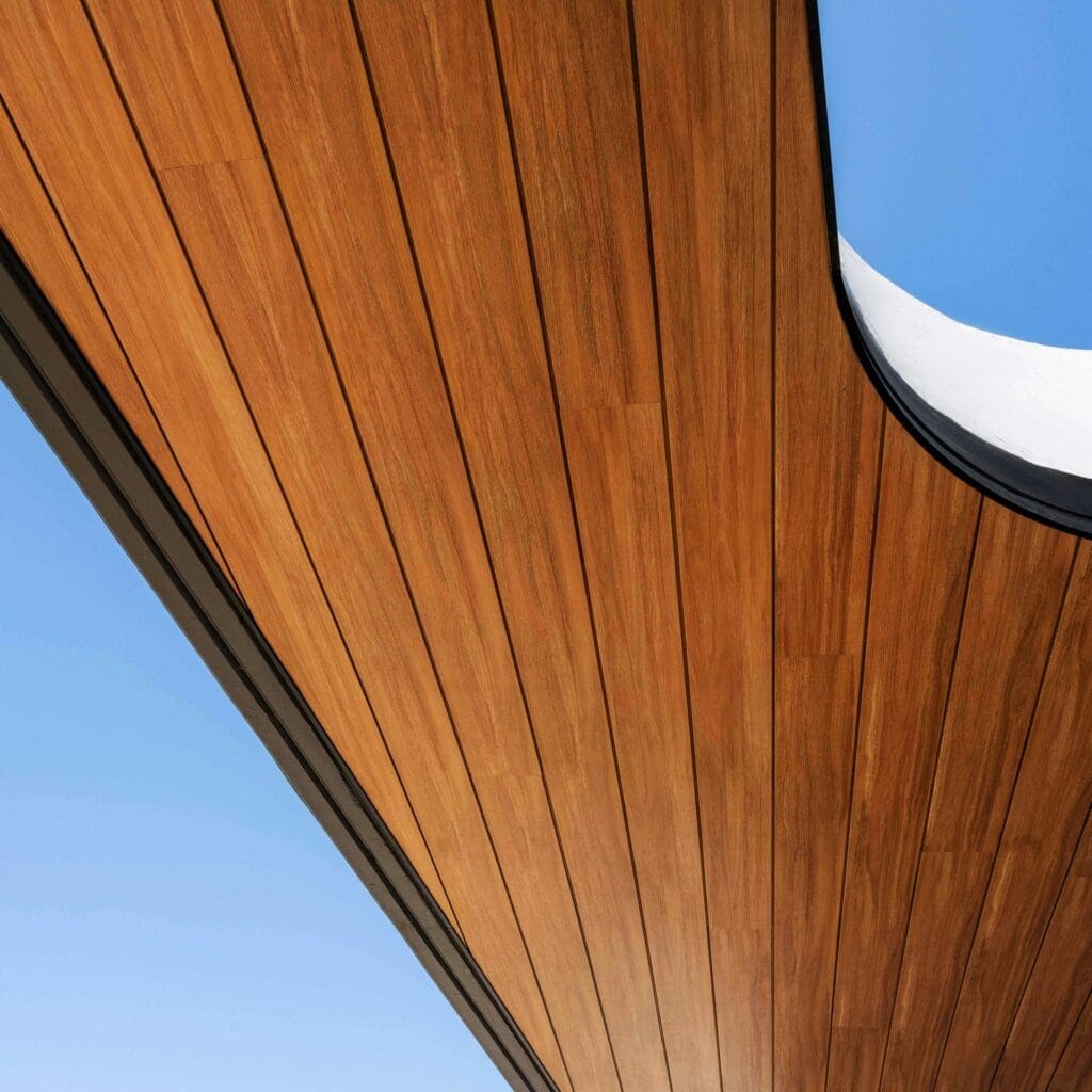 A close-up of Aluminum soffit wood design.