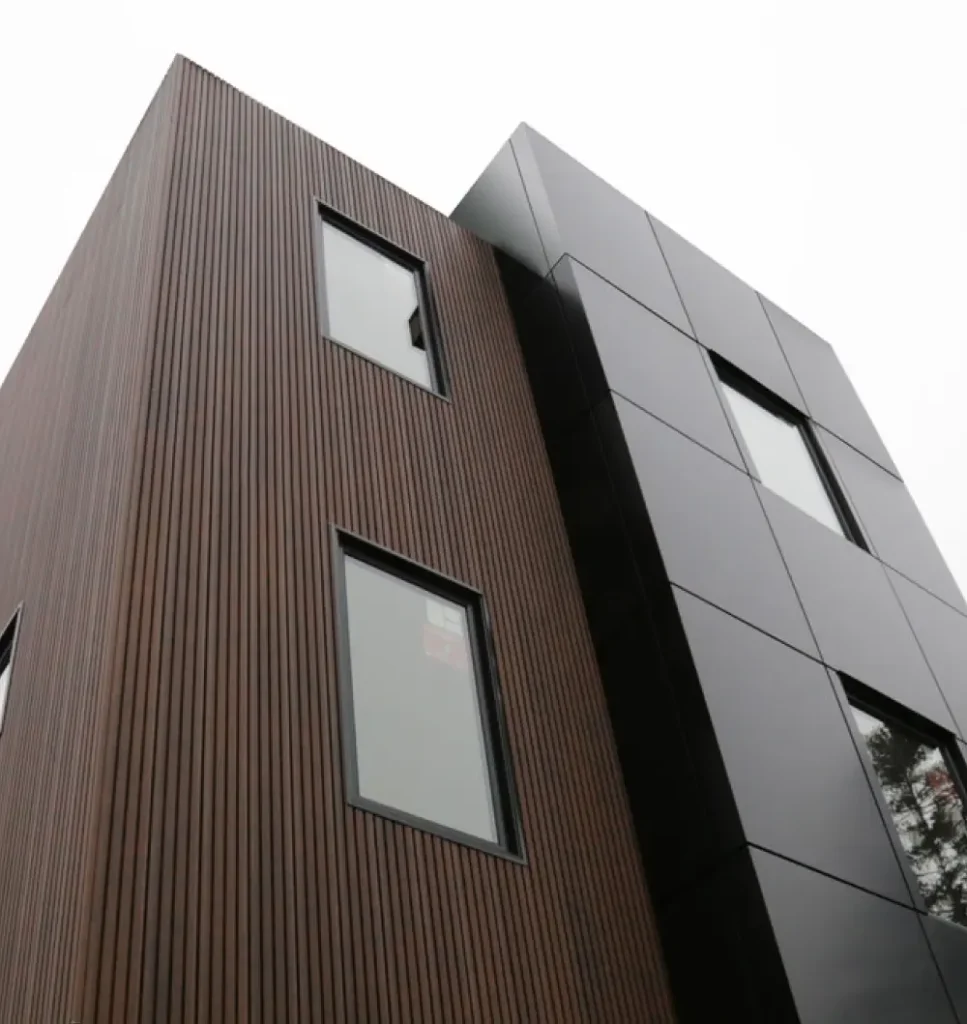 Modern home exterior with NORTwood wood composite fluted panels