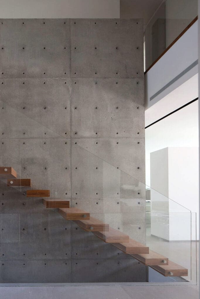 an interior wall featured by precast concrete panels
